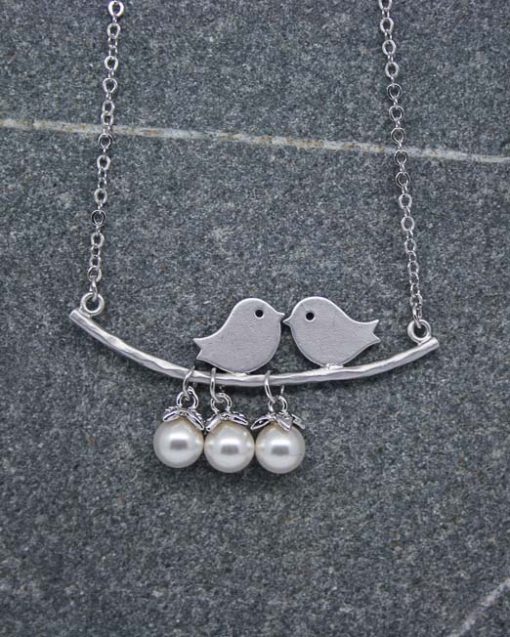 Two birds on a branch necklace with pearl drops 1
